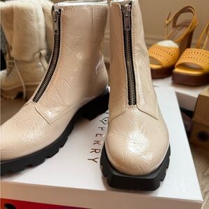Katy Perry Patent Cream Front-Zip Lug Sole Moto Boots